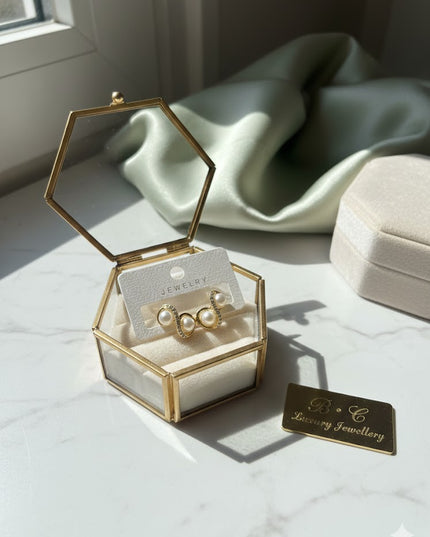 Gold Bow Pearl Stud Earrings with Crystal Detail