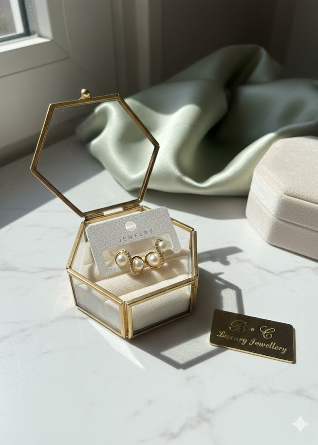 Gold Bow Pearl Stud Earrings with Crystal Detail